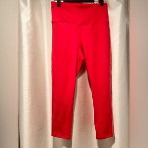 Bright pink Daisy Fuentes side stripe leggings